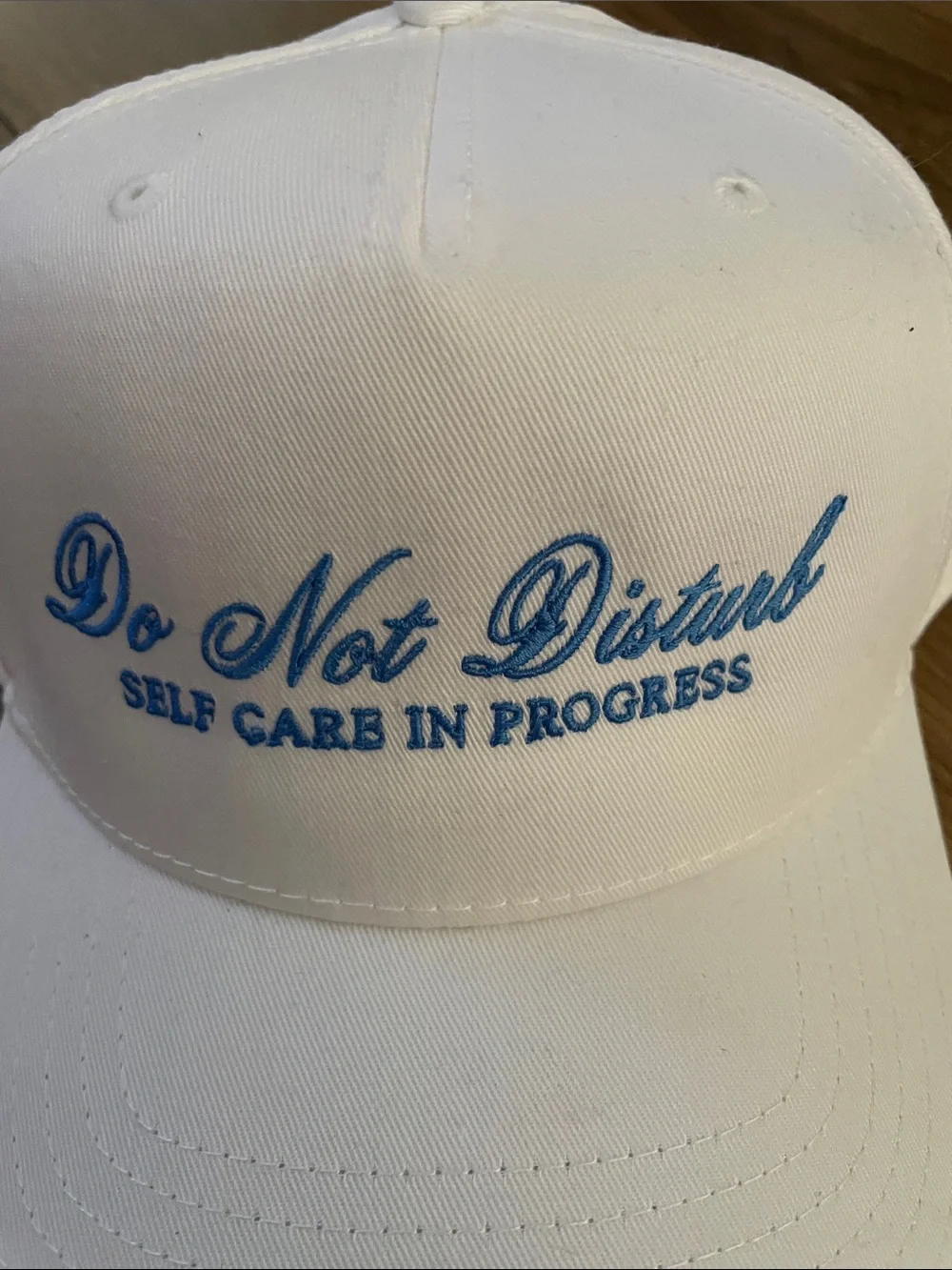 Do Not Disturb Embroidered Baseball Cap - White with Blue Text